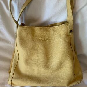 American Leather Co. yellow leather shoulder bag with 3 compartments